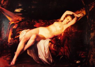 Nude woman in a hammock